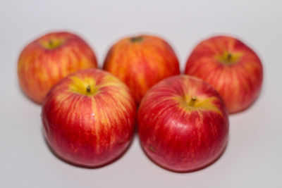 Close-up of apples on white background