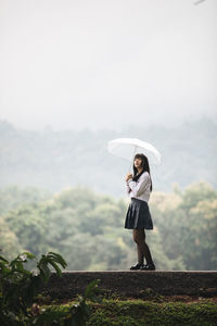 Woman standing on land