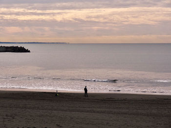 Scenic view of sea against sky during sunrise