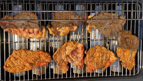 Close-up of meat on barbecue grill
