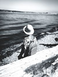Woman looking at sea shore