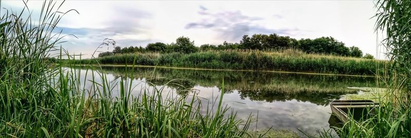 Scenic view of lake against sky