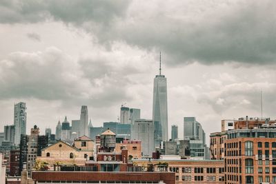 Modern buildings in city against sky