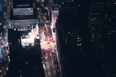 High angle view of illuminated buildings at night