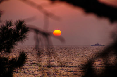Scenic view of calm sea at sunset