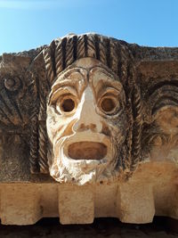 Low angle view of sculpture against clear sky