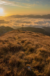 Scenic view of mountains against sky during sunset