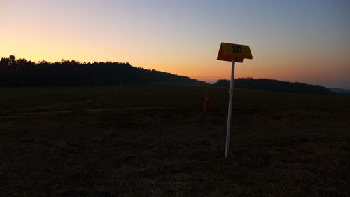 Scenic view of landscape at sunset