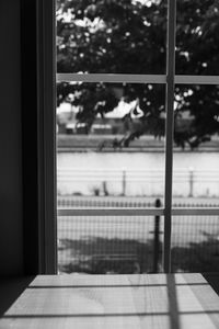 Close-up of glass window on table