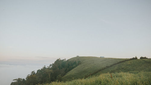 Scenic view of land against clear sky