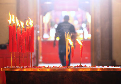 Candles and incenses in shrine temple in chinatown,chinese new year theme