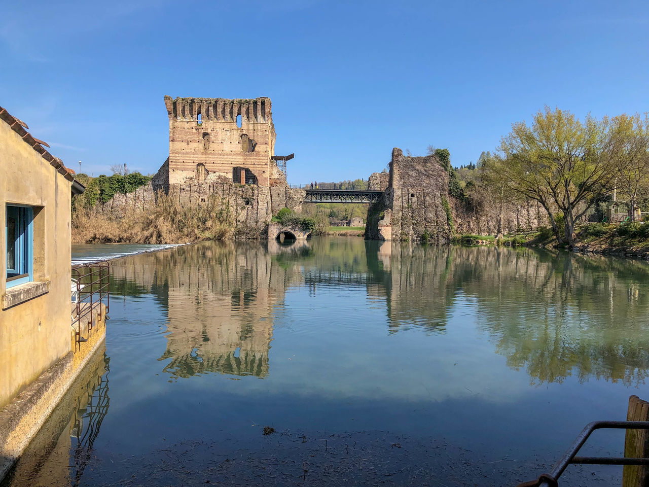 REFLECTION OF BUILDING ON WATER