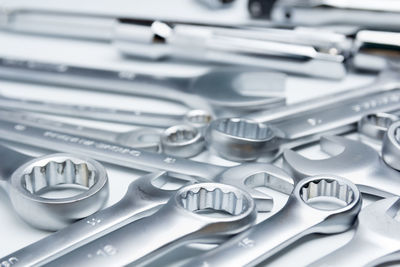 High angle view of wrenches on white background