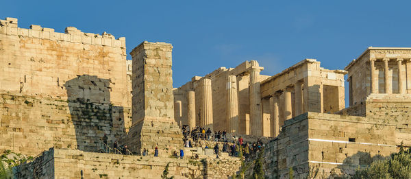 Low angle view of historical building against blue sky