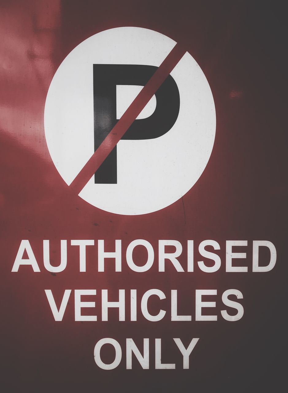 CLOSE-UP OF WARNING SIGN