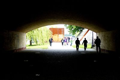 Full length of woman in tunnel