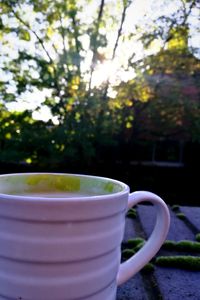 Close-up of coffee cup on table