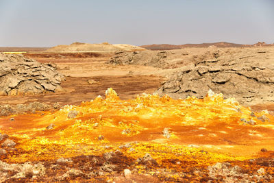 Scenic view of desert against sky