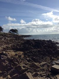 Scenic view of beach against sky