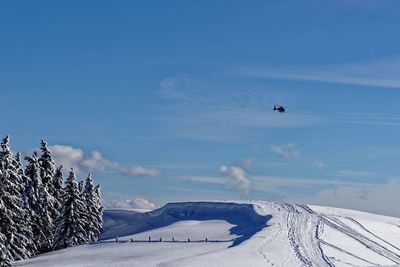 Scenic view of snow covered mountain against sky