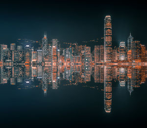 Illuminated buildings in city at night