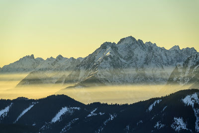 Austria, tyrol, wiedersberger horn at foggy dusk