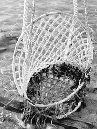 Close-up of fishing net in basket