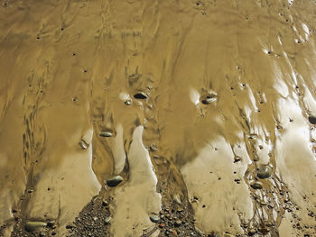 High angle view of mud on beach