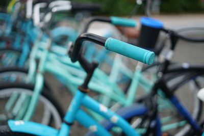 Close-up of bicycle in row