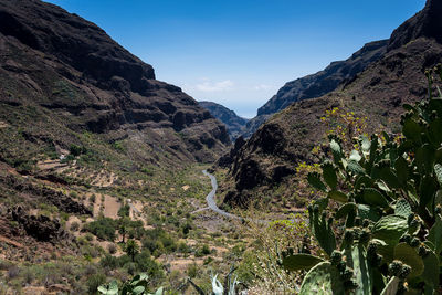Scenic view of mountains against clear sky