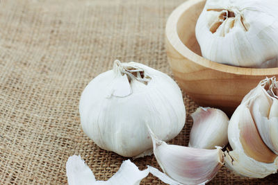 Close-up of garlic on table