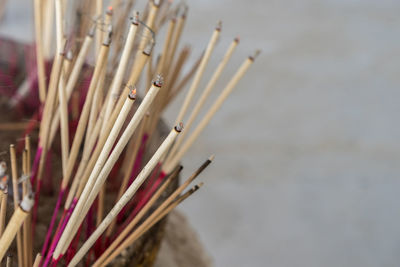 Close-up of burning incense sticks