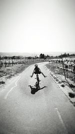 Man riding motorcycle on road