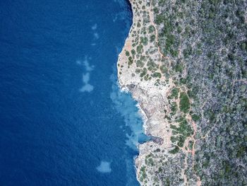 Scenic view of sea against blue sky