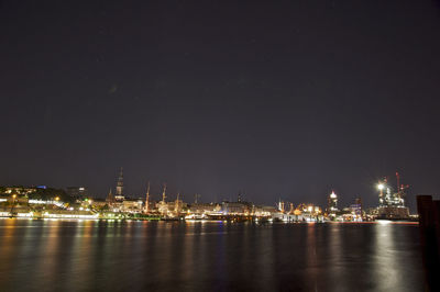 Illuminated cityscape at night