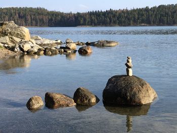 Scenic view of rocks in lake