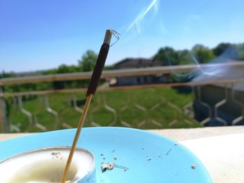 View of smoke against clear blue sky