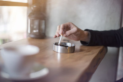 Midsection of man preparing food at home