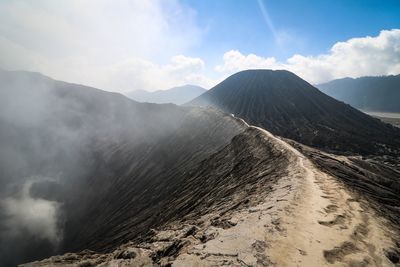 Panoramic view of volcanic mountain against sky