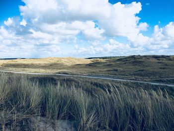 Scenic view of land against sky