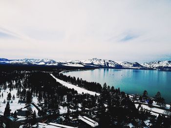 View of frozen lake against cloudy sky