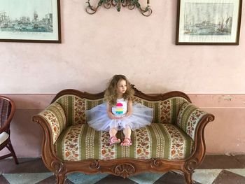 Portrait of woman sitting on seat