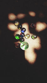 High angle view of multi colored balls on table