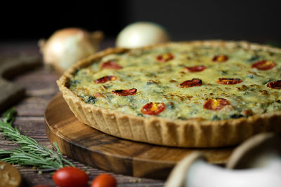 Close-up of pizza on cutting board