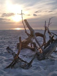 Scenic view of frozen sea against sky during sunset