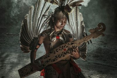 Young woman playing guitar