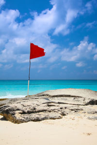 Scenic view of beach against sky