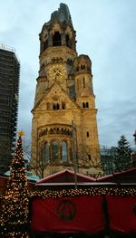 Low angle view of clock tower against sky