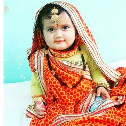 Portrait of cute girl in traditional clothing