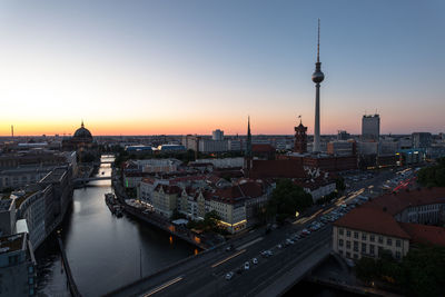 High angle view of city buildings during sunset